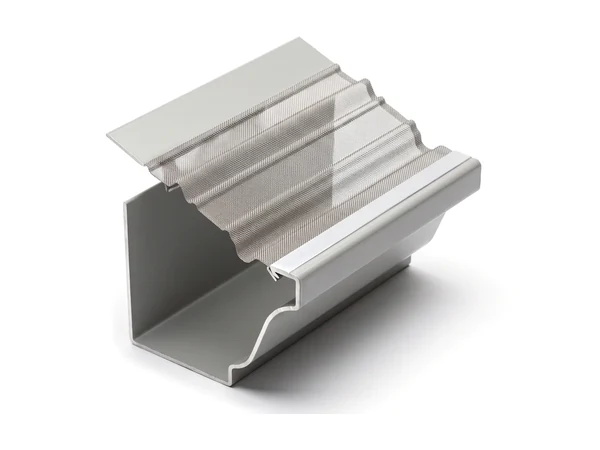 A stainless-steel mesh gutter guard on a grey K-style gutter: fine woven mesh between solid aluminum edges, sloping up from the gutter’s lip
