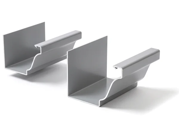 A 5 inch and a 6 inch K-style gutter in grey, their cut ends showing the crown-molding shape